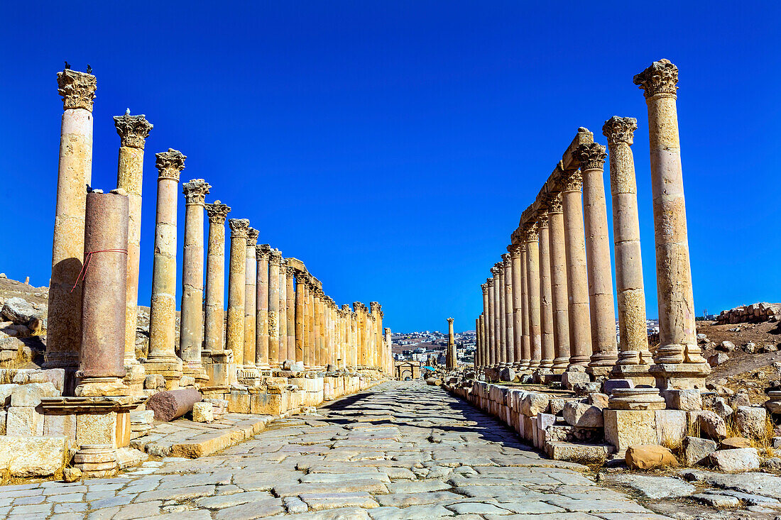 Corinthian Columns Ancient Roman Road City Jerash, Jordan. Jerash came to power 300 BC to 100 AD and was a city through 600 AD. Famous Trading Center. Most original Roman City in the Middle East.