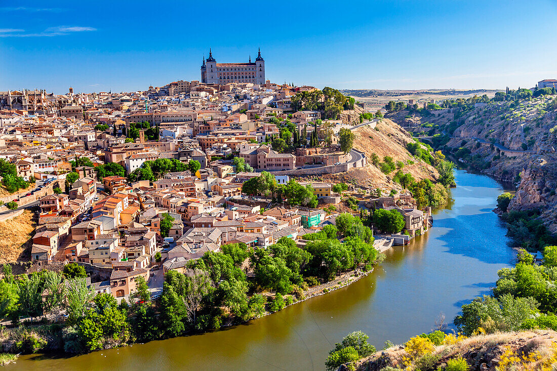 Fortress, Medieval City, Tagus River, Toledo, Spain. Toledo Alcazar built in the 1500s, Destroyed in Spanish Civil War and then rebuilt after war. Unesco historical site, Tagus is longest river in Spain.