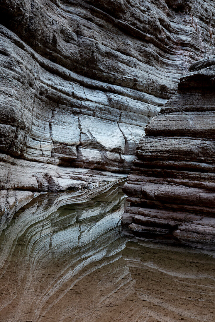 USA, Arizona. Reflections of geological formations, Matkatamiba Canyon, hiking from the Colorado River, Grand Canyon National Park.