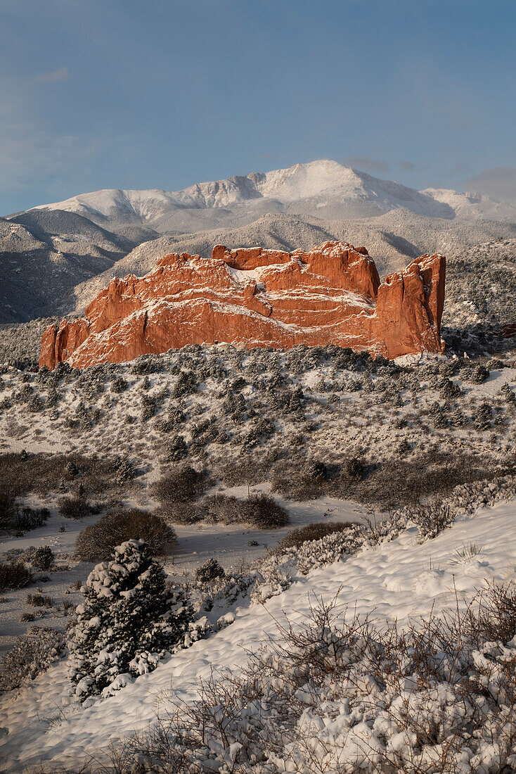 USA, Colorado, Garden of the Gods. Fresh snow on Pikes Peak and sandstone formation