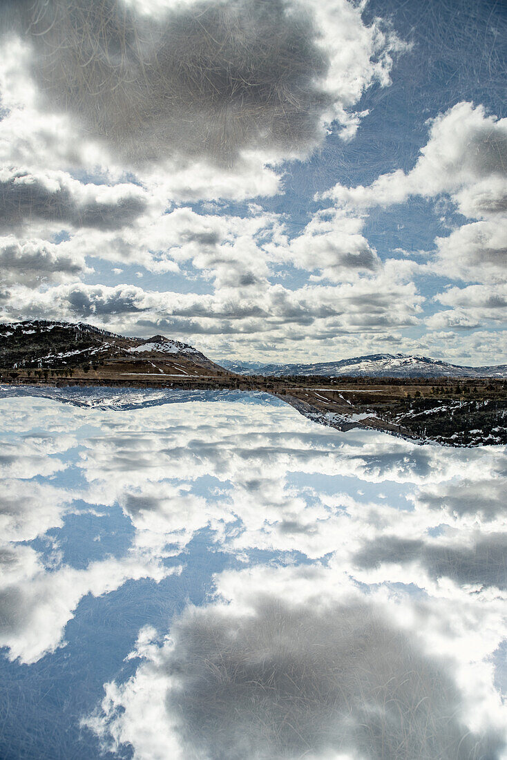 Panoramic double exposure of the Grand Teton mountain range.