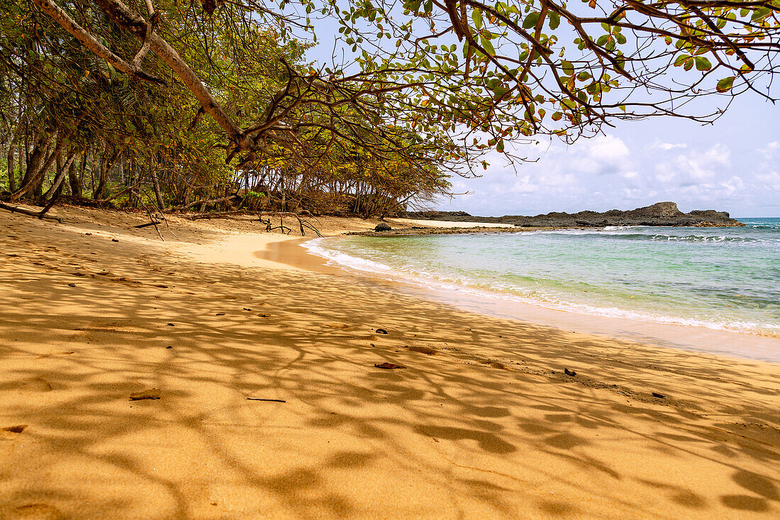 Sandy beach Praia Piscina in the south of the island of São Tomé in West Africa