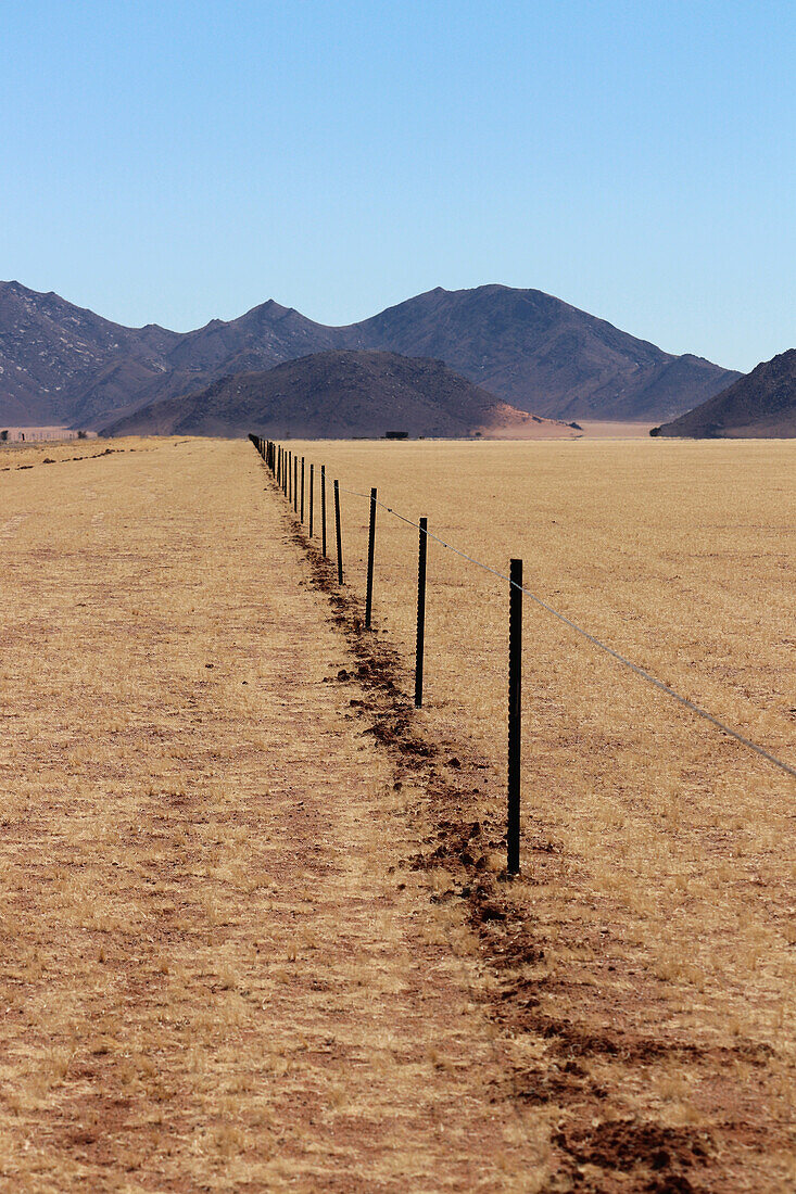 Namibia; Southern Namibia; Hardap region; Namib Desert; Electric fence and demarcation of a farm