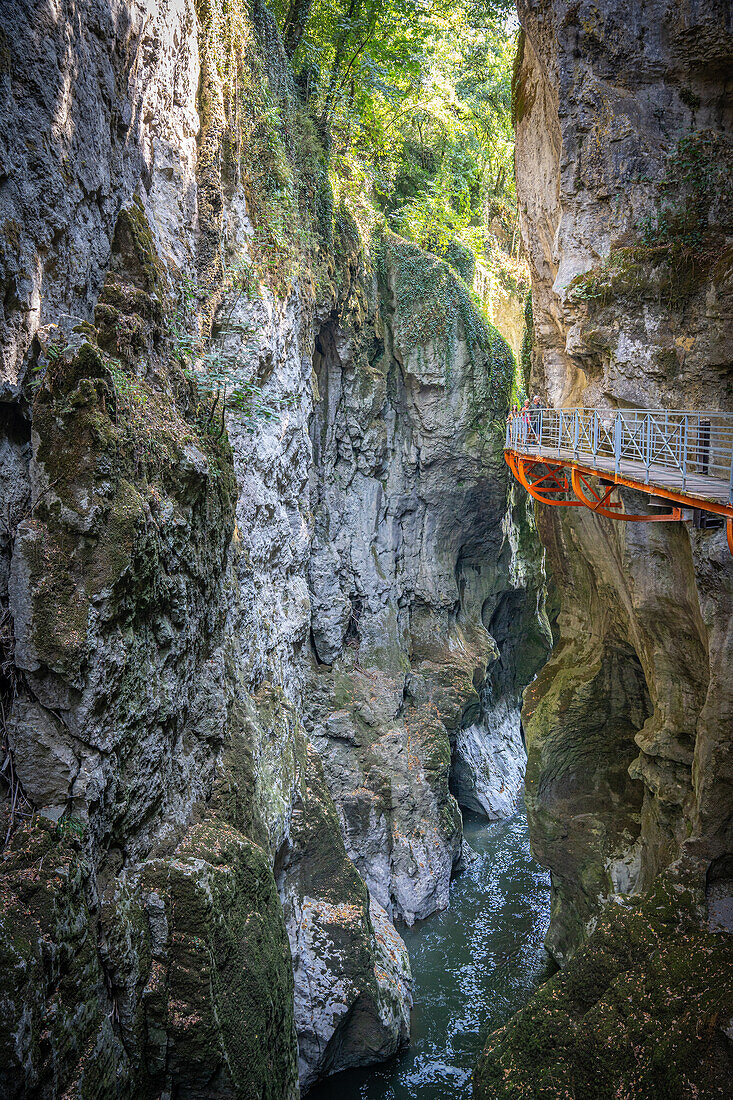 Gorge du Fier with people walking on a balcony-like plank path, Gorge du Fier, Annecy, Haute-Savoie, Auvergne-Rhône-Alpes, France