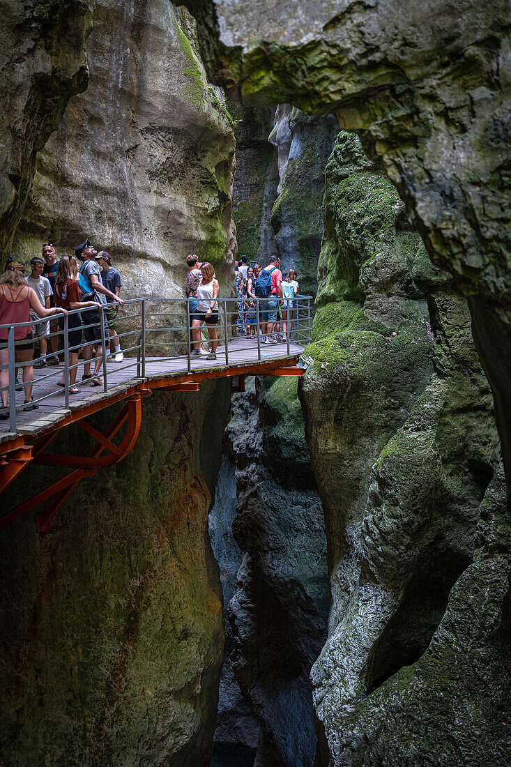 Gorge du Fier with people walking on a balcony-like plank path, Gorge du Fier, Annecy, Haute-Savoie, Auvergne-Rhône-Alpes, France