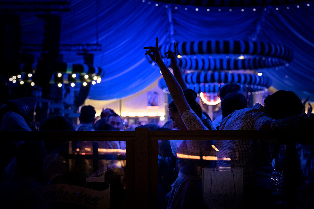 View of a beer tent with people celebrating at the Oktoberfest, Munich, Bavaria, Germany, Europe