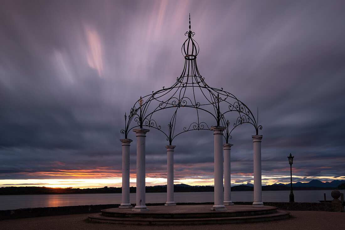 View of a pavilion on the shore of Waginger See at sunrise, Bavaria, Germany, Europe