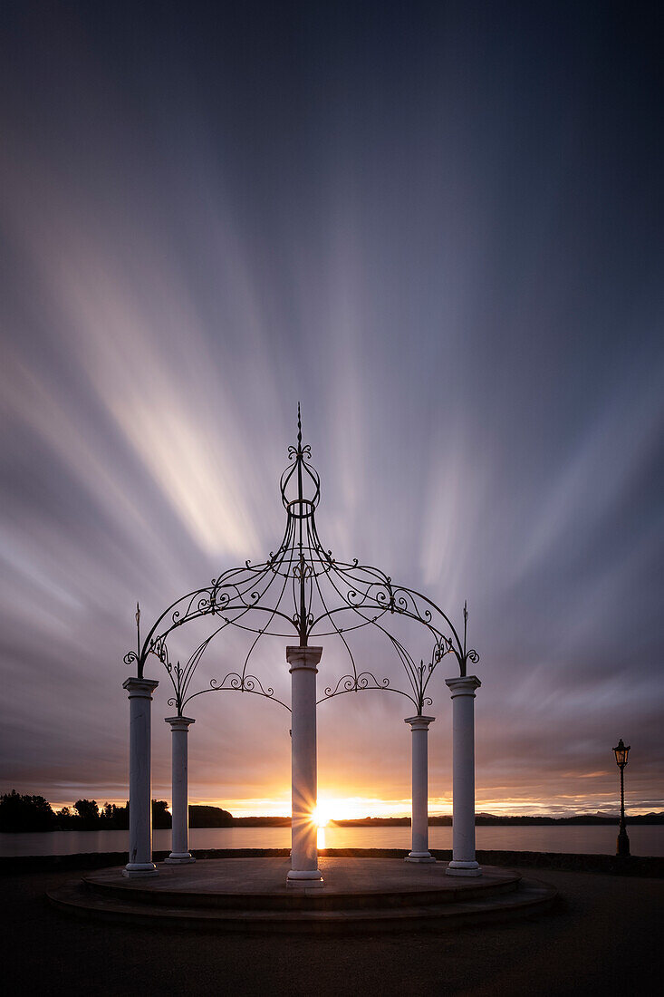 View of a pavilion on the shore of Waginger See at sunrise, Bavaria, Germany, Europe