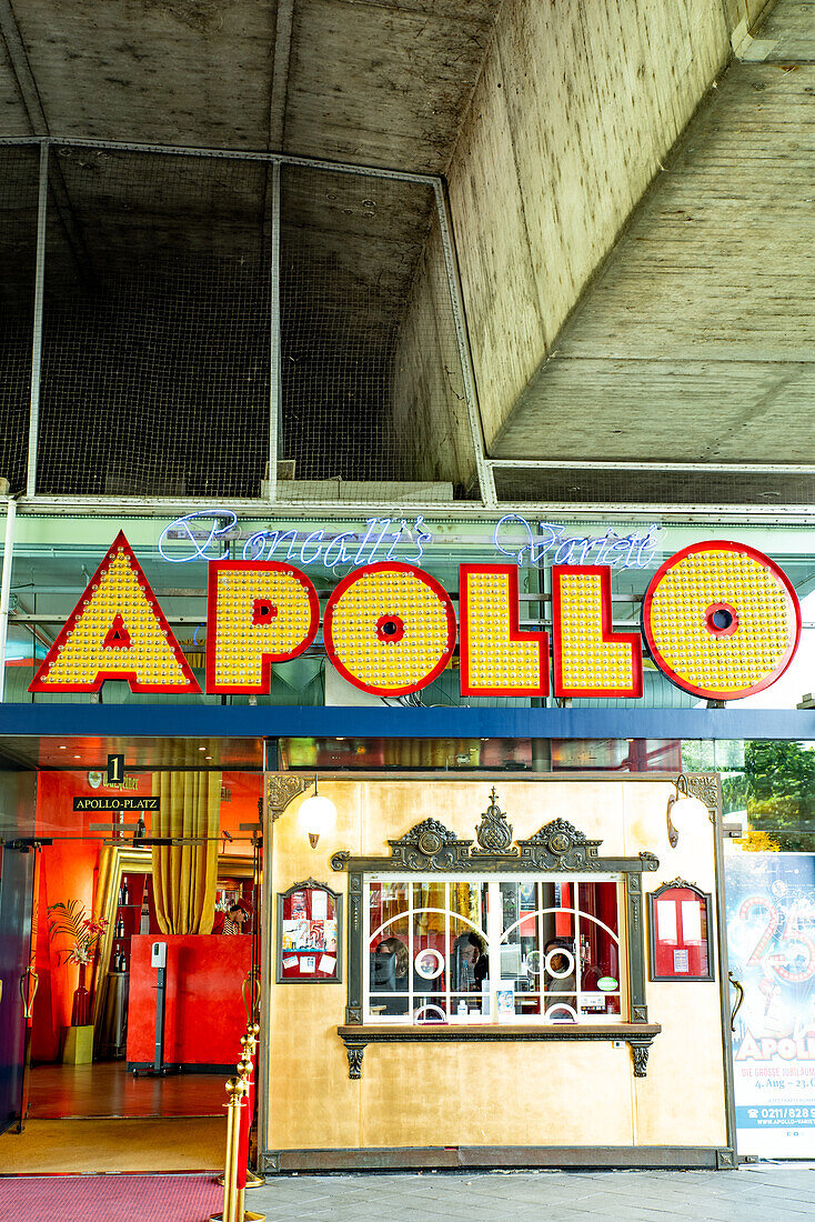 Roncalli's Apollo Variety Theatre perched underneath the Rheinkniebrücke over the Rhine river in Düsseldorf, Germany