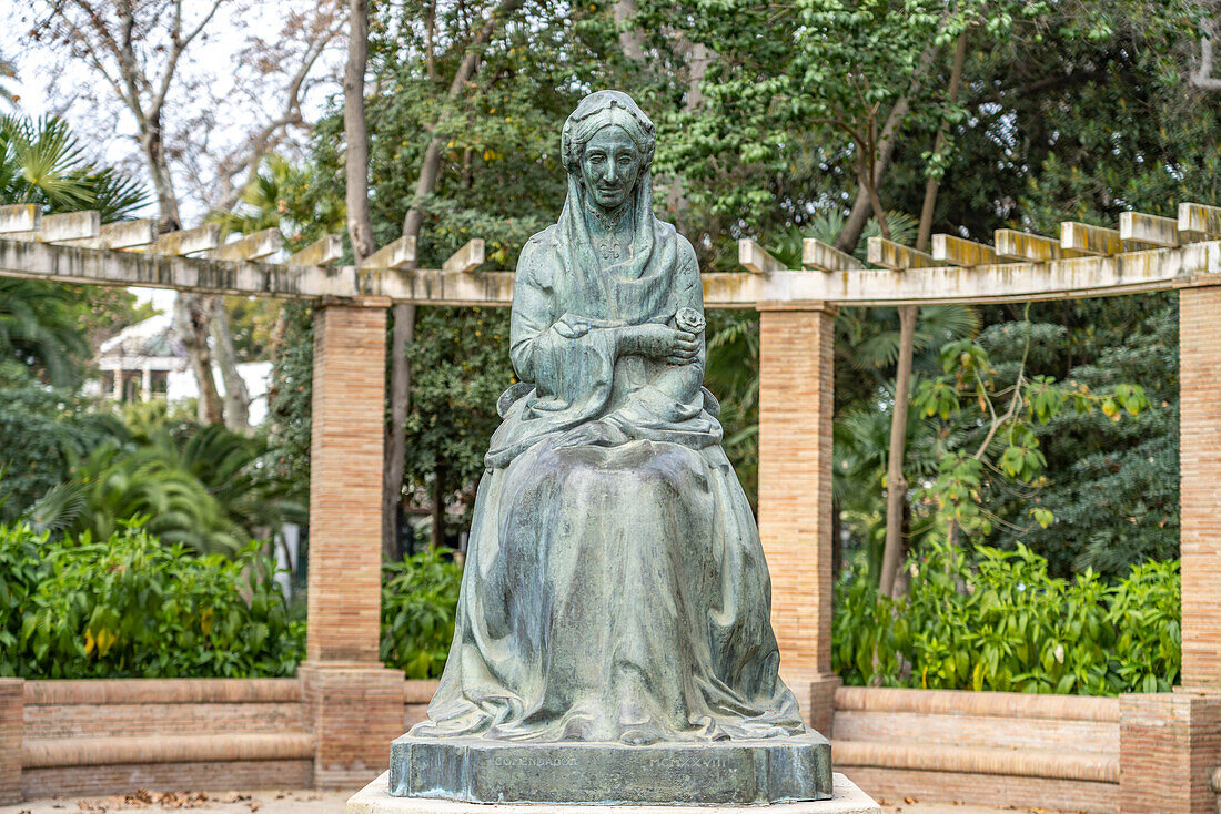 Bronze statue of Princess Luisa Fernanda by Enrique Pérez Comendador in María Luisa Park, Seville, Andalusia, Spain