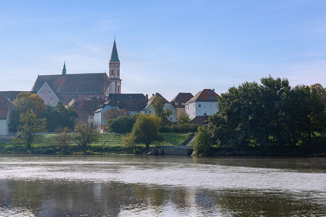 Danube River with a view of Karmeliterkirche Hl. Geist and the historical center in Straubing in Lower Bavaria in Germany