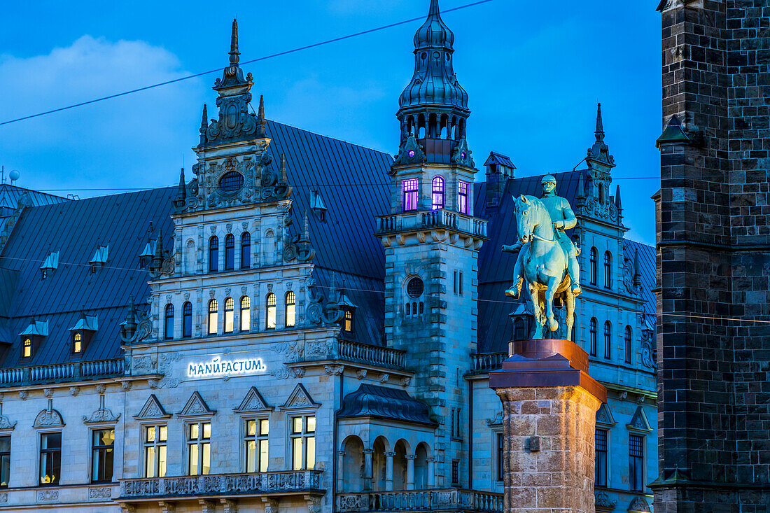 The Bismarck Monument at Bremen Cathedral and Manufactum Building at dusk, Free Hanseatic City of Bremen, Germany, Europe