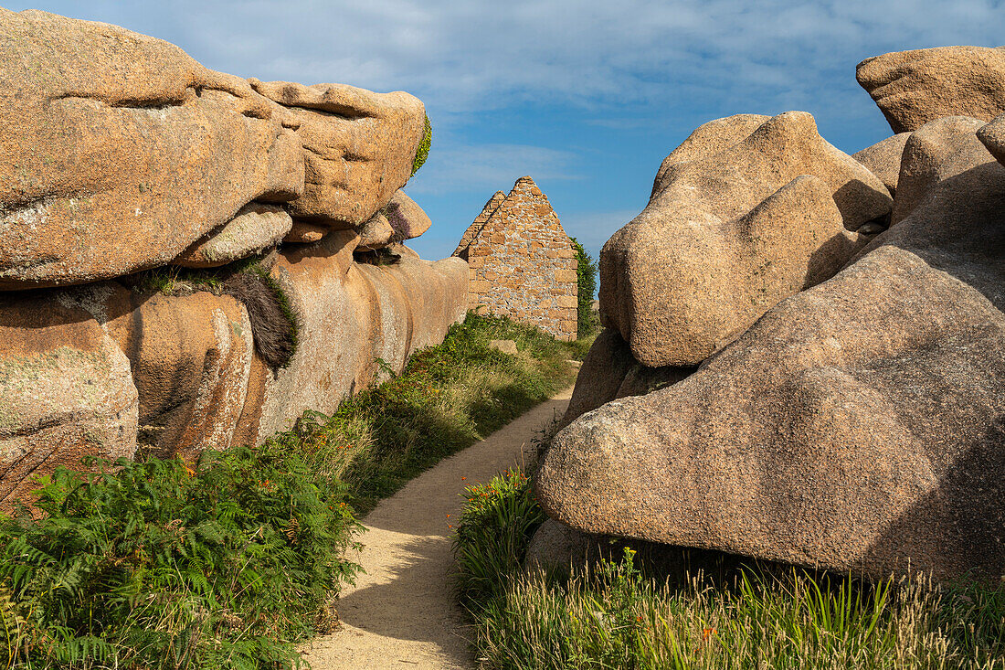 Ruins on the path of the customs officers, granite coast Côte de Granit Rose near Ploumanac'h, Perros-Guirec, Brittany, France
