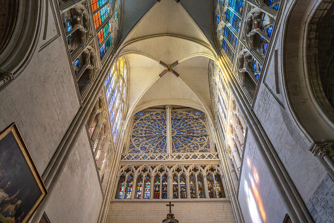 Rose window and church ceiling in the interior of the Saint-Gatien Cathedral in Tours, Loire Valley, France