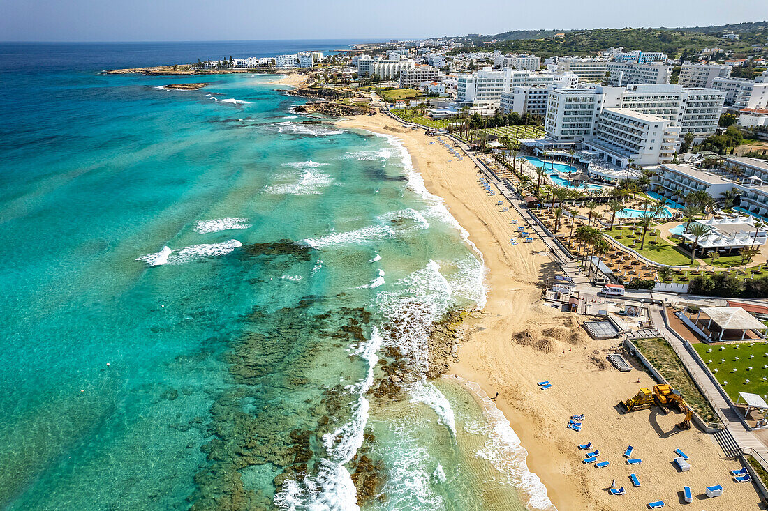 Hotels at Vrissiana and Sunrise Beach seen from the air, Protaras, Cyprus, Europe