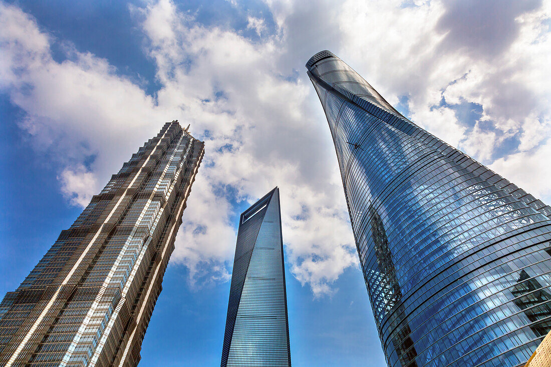 Three skyscrapers reflection making patterns, Liujiashui Financial District, Shanghai, China. Shanghai Tower, Shanghai World Financial Center and Jin Mao Tower