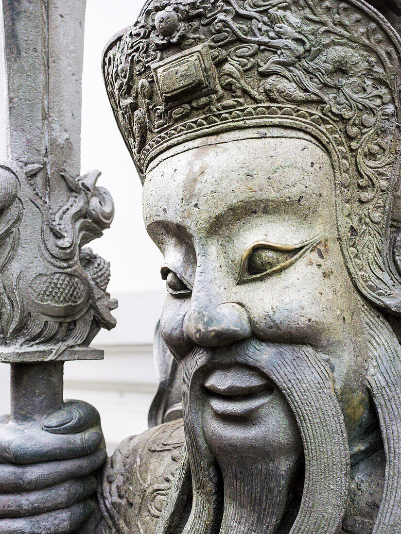 Thailand, Bangkok, Chinese warrior guardian statue at Wat Pho Buddhist temple
