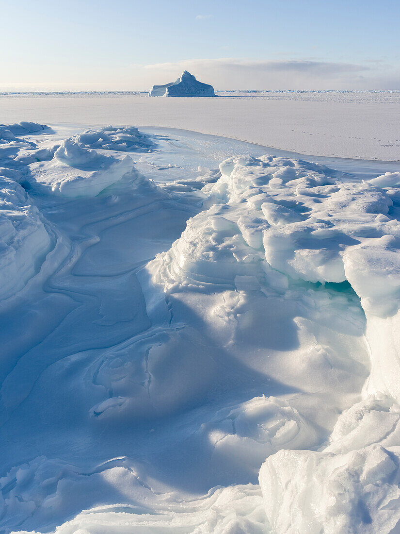 Shore of frozen Disko Bay during winter, West Greenland, Denmark
