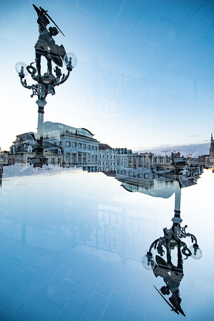 Double exposure of a statue of Saint Michael slaying the dragon in Ghent, Belgium.