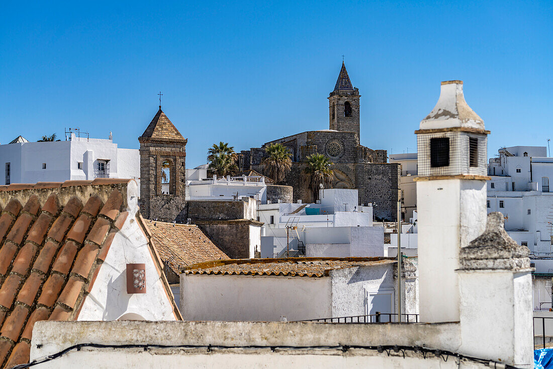 Parish Church of Divino Salvador and white houses of Vejer de la Frontera, Andalusia, Spain
