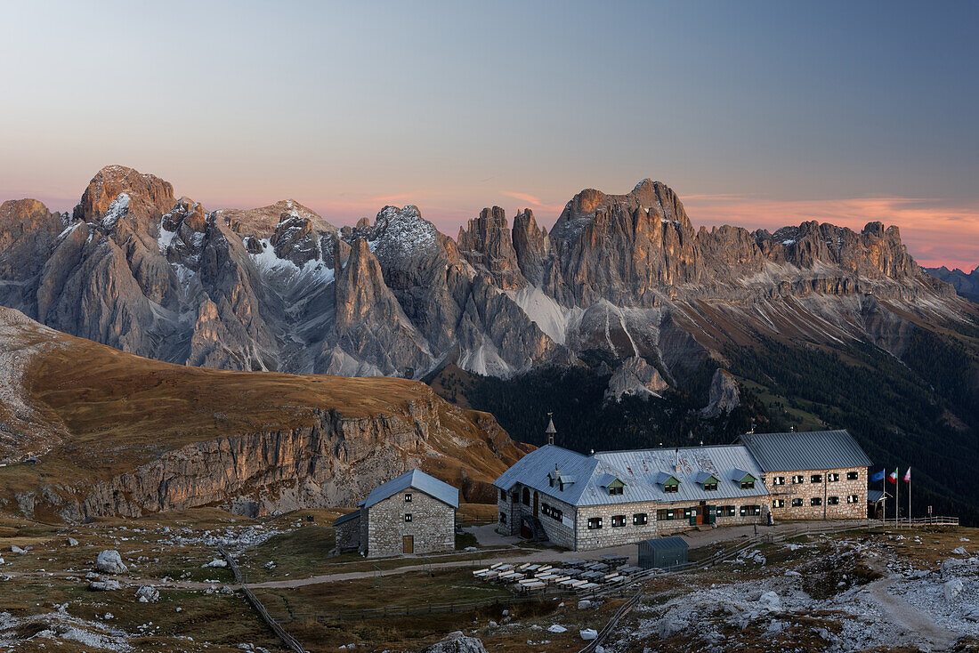 The Schlernhaus in front of the Rosengarten, Dolomites, South Tyrol, Italy.