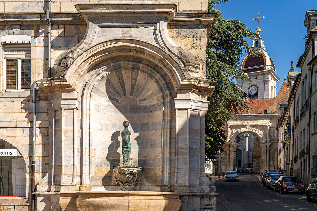 Fountain in the old town and St. John's Cathedral in Besancon, Bourgogne-Franche-Comté, France, Europe