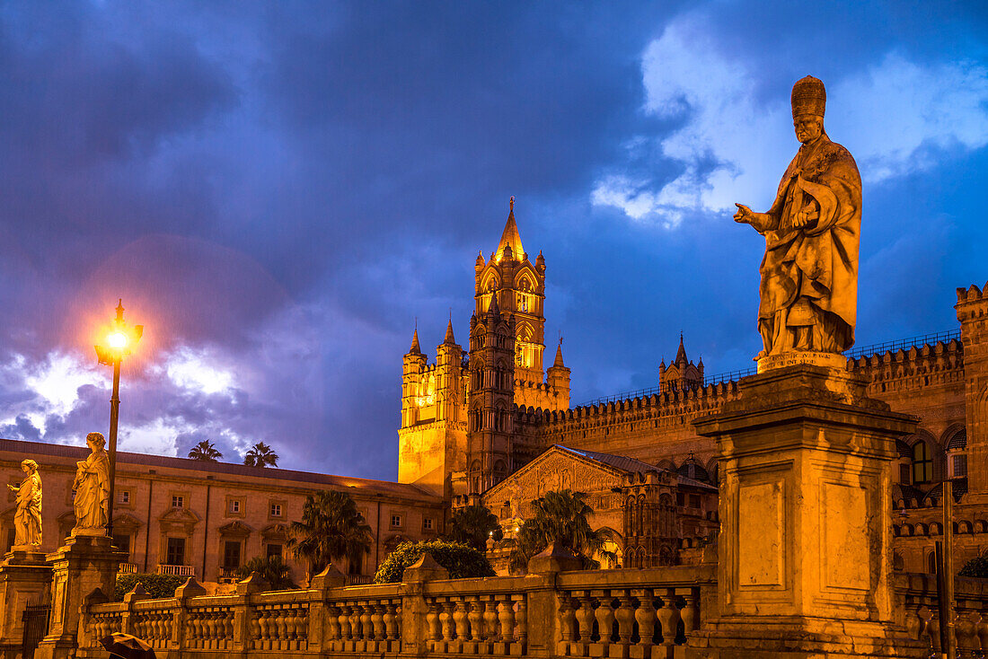 Statue in front of the Cathedral of Maria Santissima Assunta at dusk, Palermo, Sicily, Italy, Europe