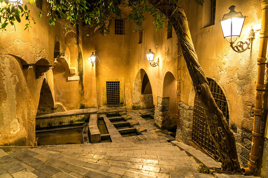The medieval washing place Lavatoio medievale in Cefalu at night, Sicily, Italy, Europe