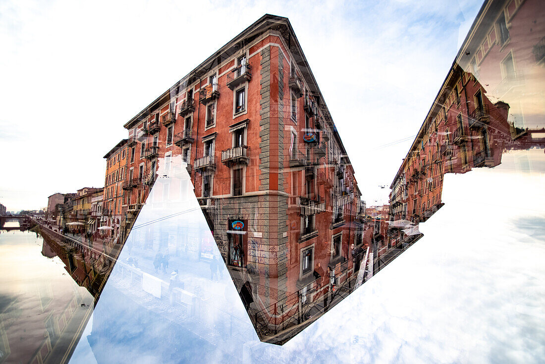 Double exposure of the buildings siding the Naviglio Grande canal in Milan, Italy.