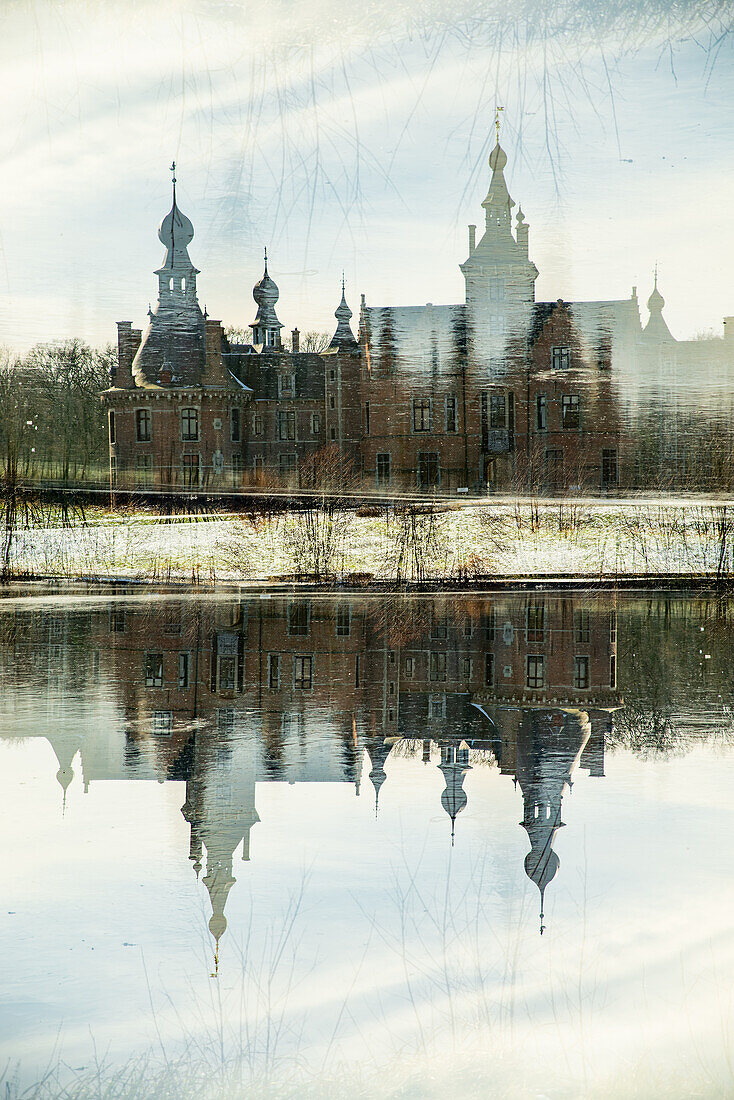 Double exposure of the fairytale castle of Ooidonk in the Ghent municipality in Belgium