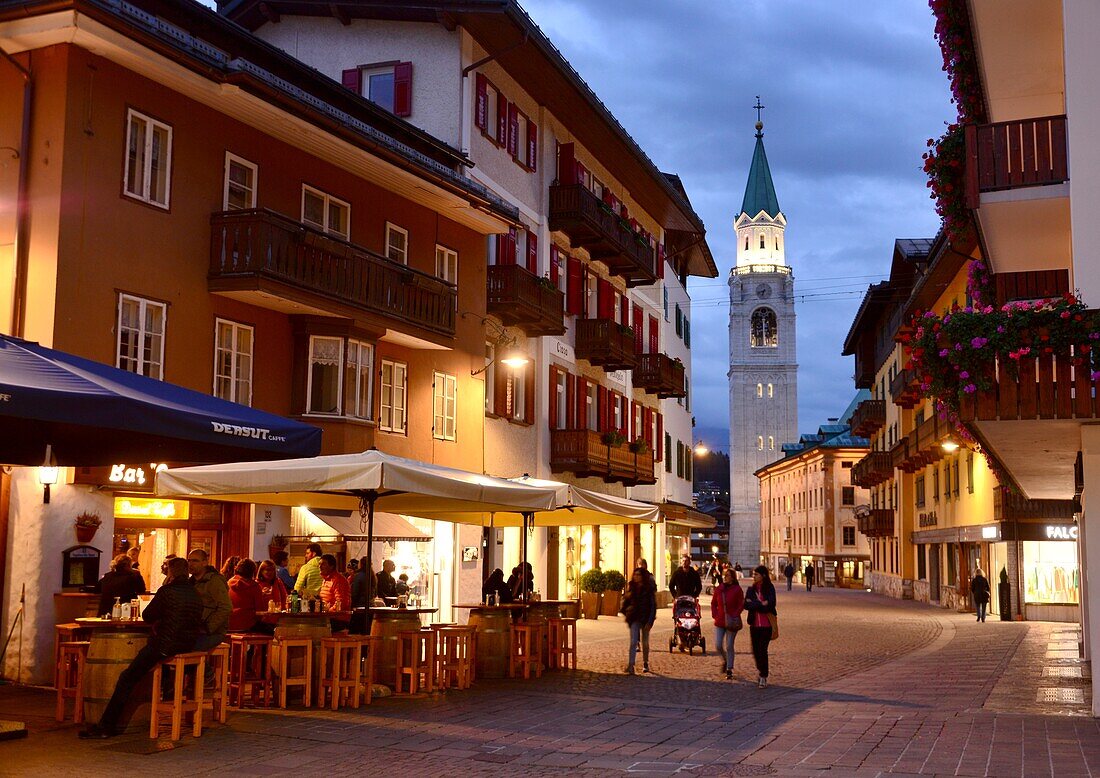 at Corso Italia with town church, Cortina d´Ampezzo, Dolomites Belluno, Veneto, Italy