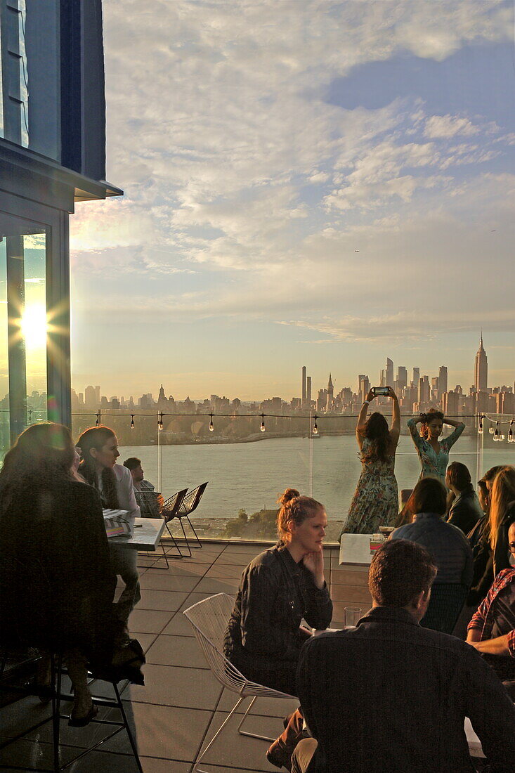 View of Midtown Manhattan from the Westlight Terrace Bar of the William Vale Hotel, Williamsburg, Brooklyn, New York, New York, USA