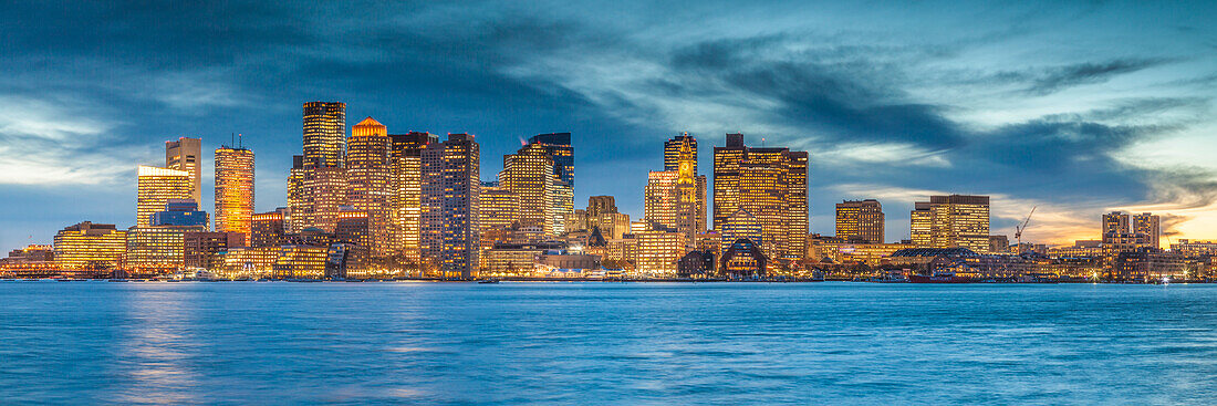 USA, New England, Massachusetts, Boston, city skyline from Boston Harbor, dusk