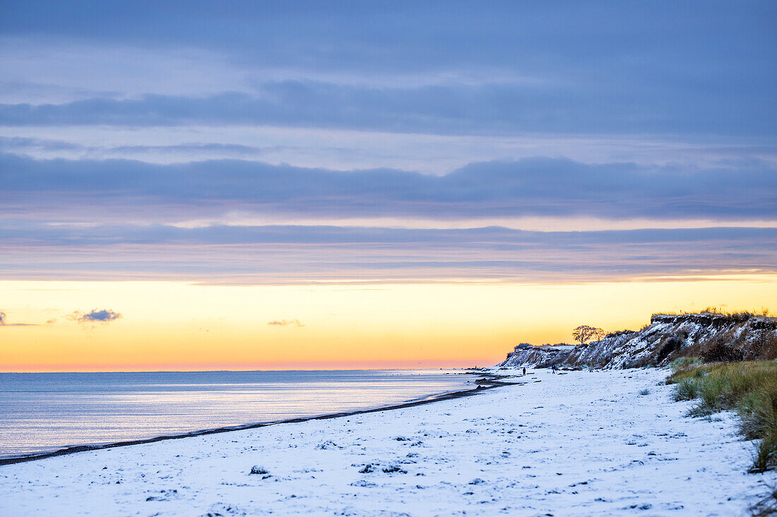 Sunrise at the wintry snowy Baltic Sea in Kraksdorf, Ostholstein, Schleswig-Holstein, Germany