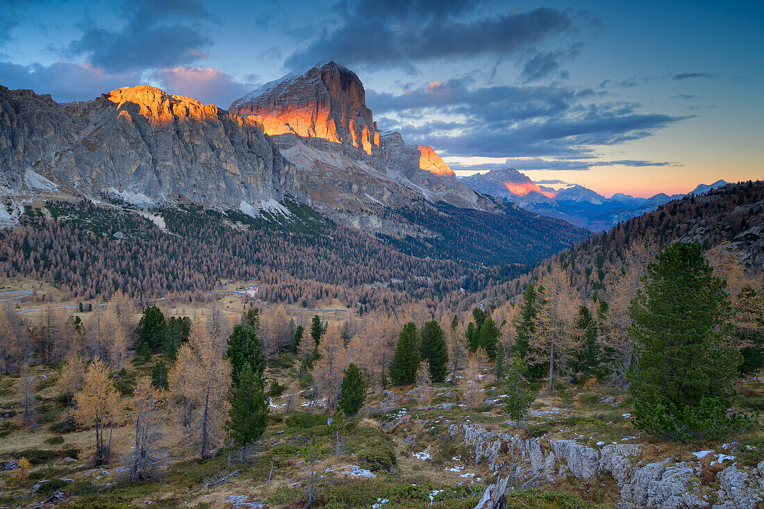 Last rays of sun at Passo Falzarego with a view of the mountains of the Dolomites.