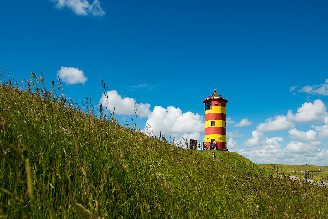 Yellow-red lighthouse, Pilsum lighthouse, Pilsum, Krummhörn, East Frisia, Lower Saxony, North Sea, Germany