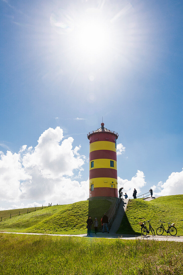 Yellow-red lighthouse, Pilsum lighthouse, Pilsum, Krummhörn, East Frisia, Lower Saxony, North Sea, Germany