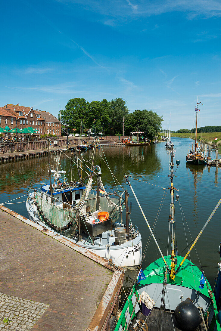 Old harbor with warehouses, Hooksiel, Wangerland, East Frisia, Lower Saxony, North Sea, Germany