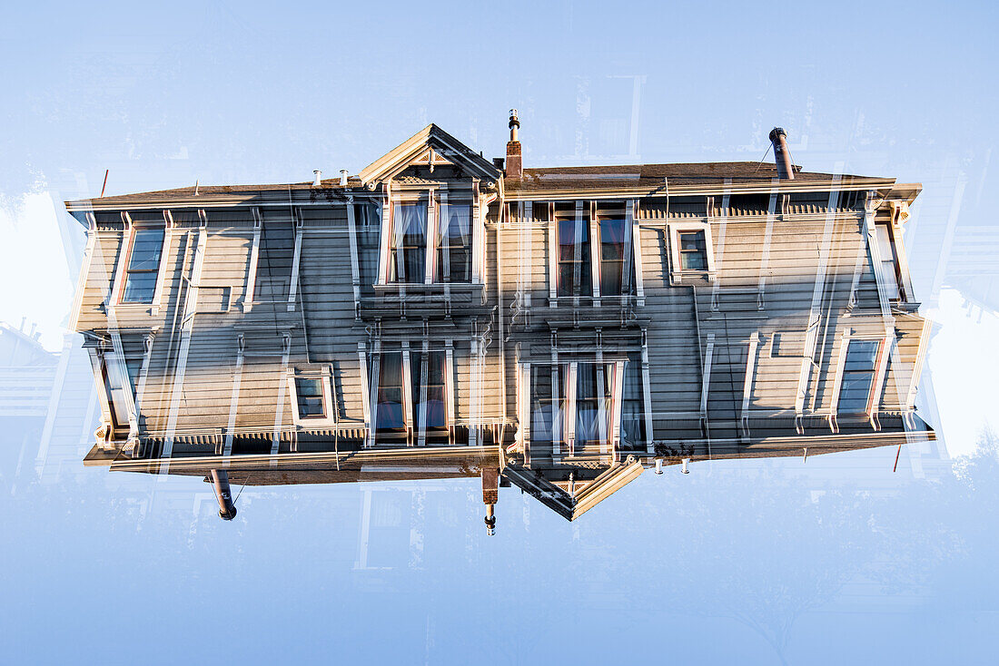 Double exposure of a Victorian style colorful wooden residential building on Steiner street in San Francisco, California. These houses are known as the Painted Ladies.