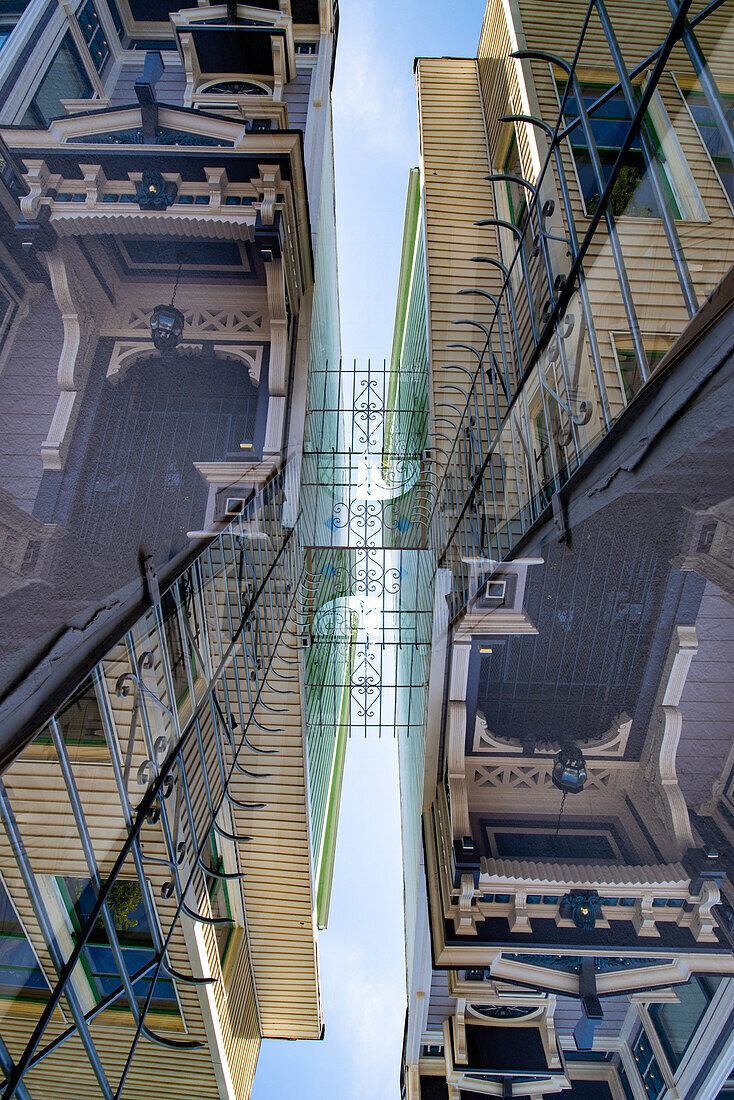 Double exposure of a wooden residential building in the famous mission district in San Francisco, California.