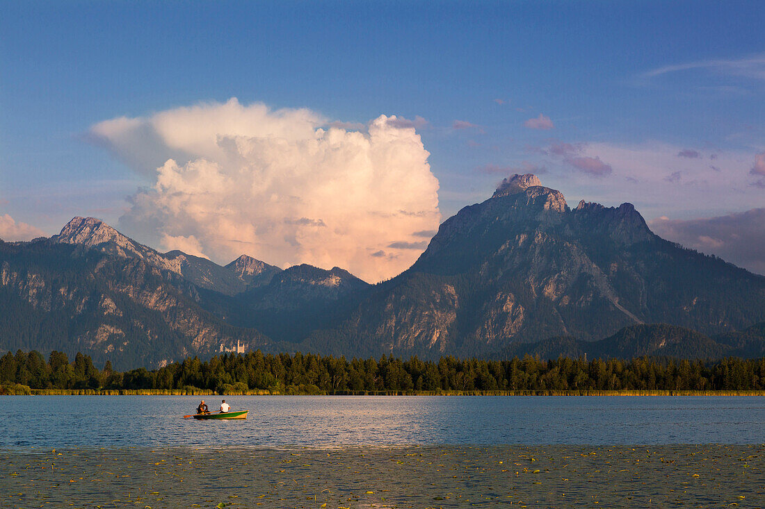 View across the Hopfensee to Neuschwanstein Castle, with Tegelberg and Säuling, Allgäu, Bavaria, Germany