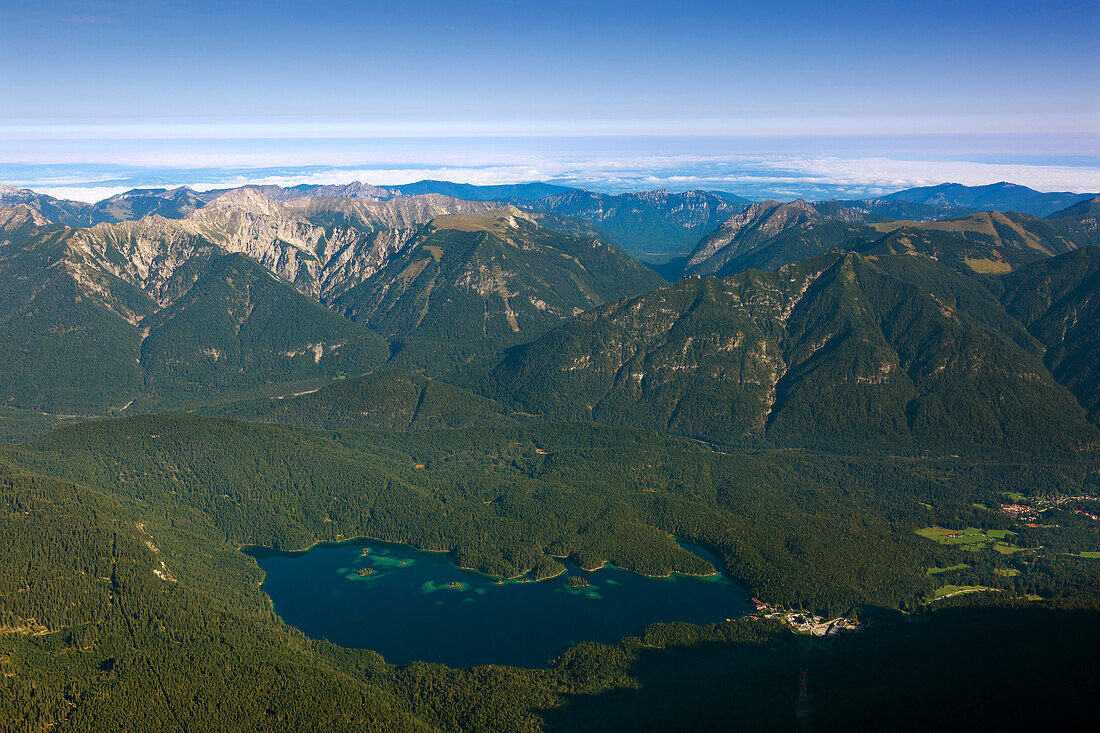 View from the summit of the Zugspitze to the Eibsee and the Ammer Mountains, Bavaria, Germany