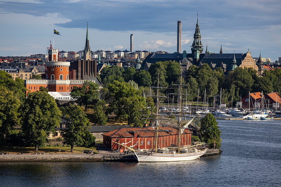 Sailing ship and Kastellet with Stockholm city behind, Stockholm, Sweden, Europe