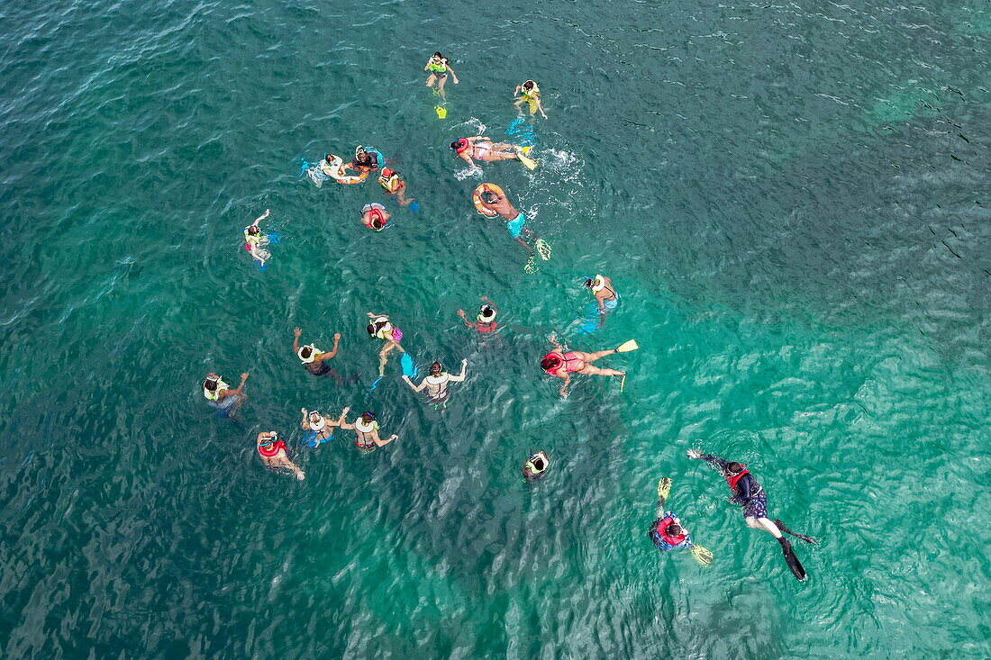 Aerial view of people swimming and snorkeling in Moilinere Bay, near Saint George's, Saint George, Grenada, Caribbean