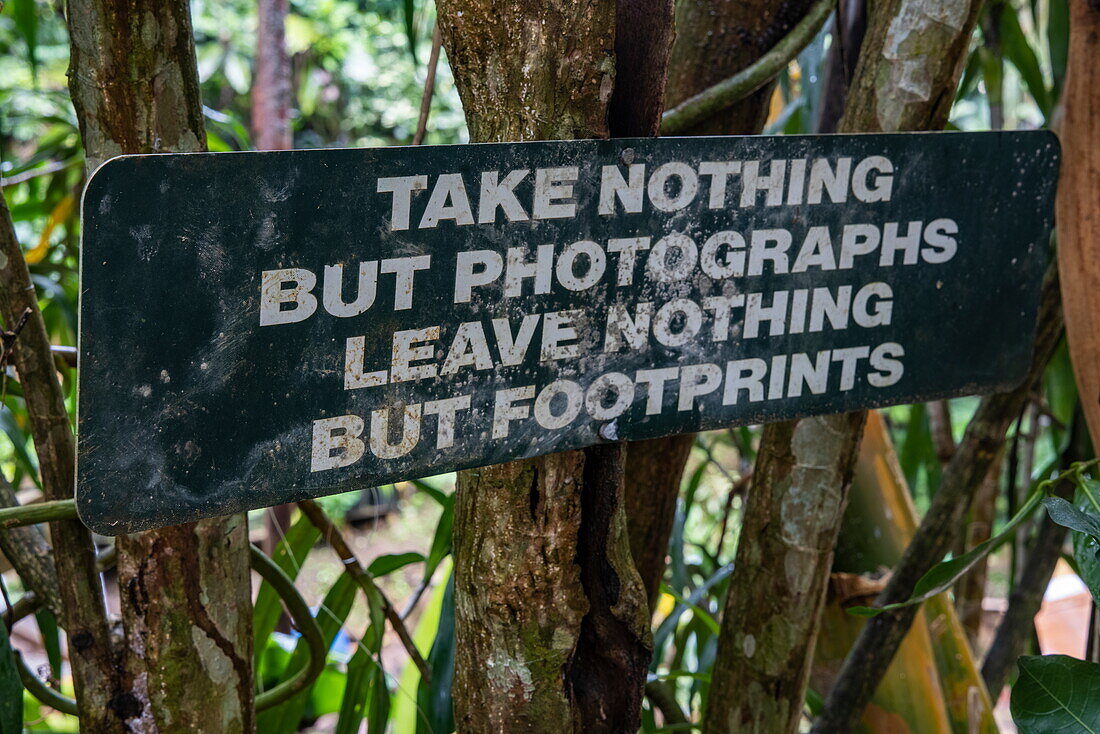&#39;Take nothing but photos, leave nothing but footprints'39; sign at Annandale Falls, St. George, Grenada, Caribbean