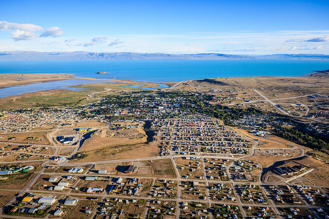 Aerial view of El Calafate, a sprawing town on the coast, a sea channel, on the edge of the Southern Patagonian Ice Field.