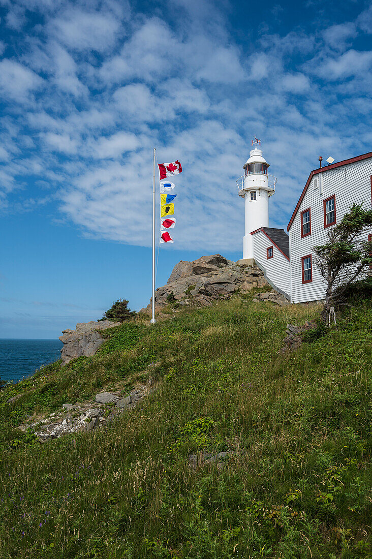 Canada, Labrador, Newfoundland, Rocky Harbor, Landscape with Lobster Cove Head Lighthouse