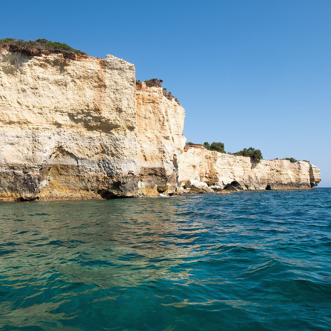 Italy, Apulia, Lecce Province, Otranto, Baia Del Mulino D'acqua, Cliffs on sea coast