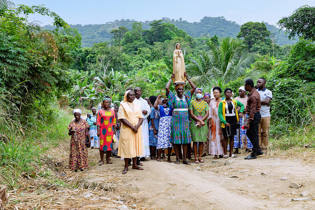 Marian procession on the Assumption Day at Lake Bosumtwi near Abono in the Ashanti Region of central Ghana in West Africa