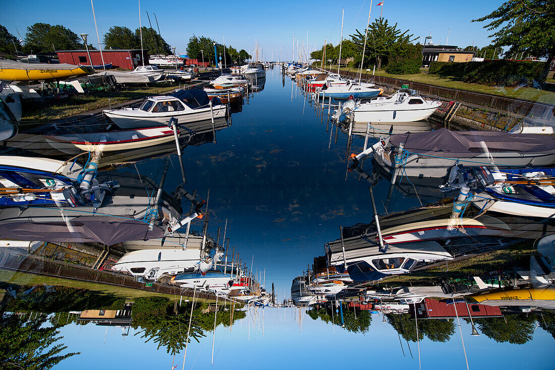 Double exposure of a yacht harbour in Copenhagen, Denmark.
